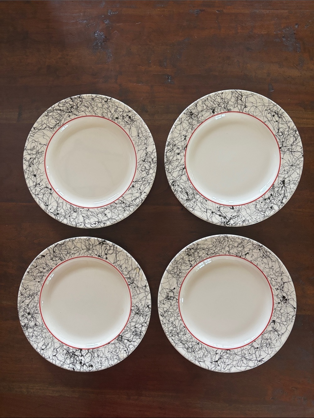 Homer Laughlin Cream Dinner Plates with Black Marble Border and Red Trim